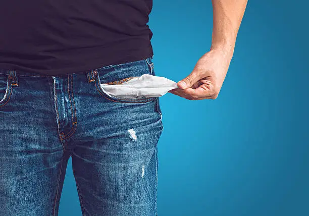 Photo of Man in jeans with empty pocket