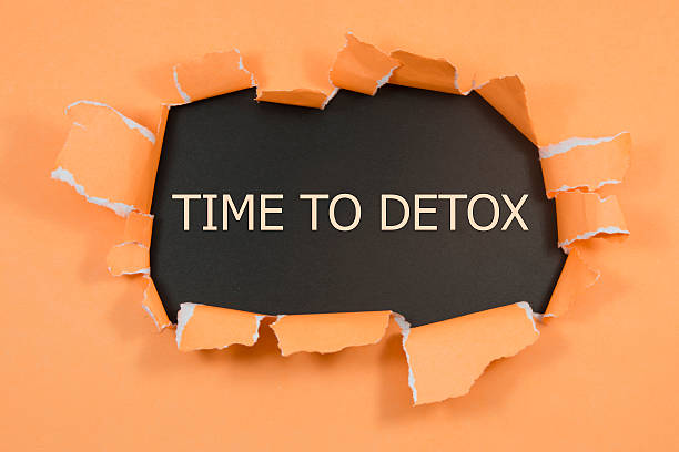 istock time to detox written under torn paper 533068190