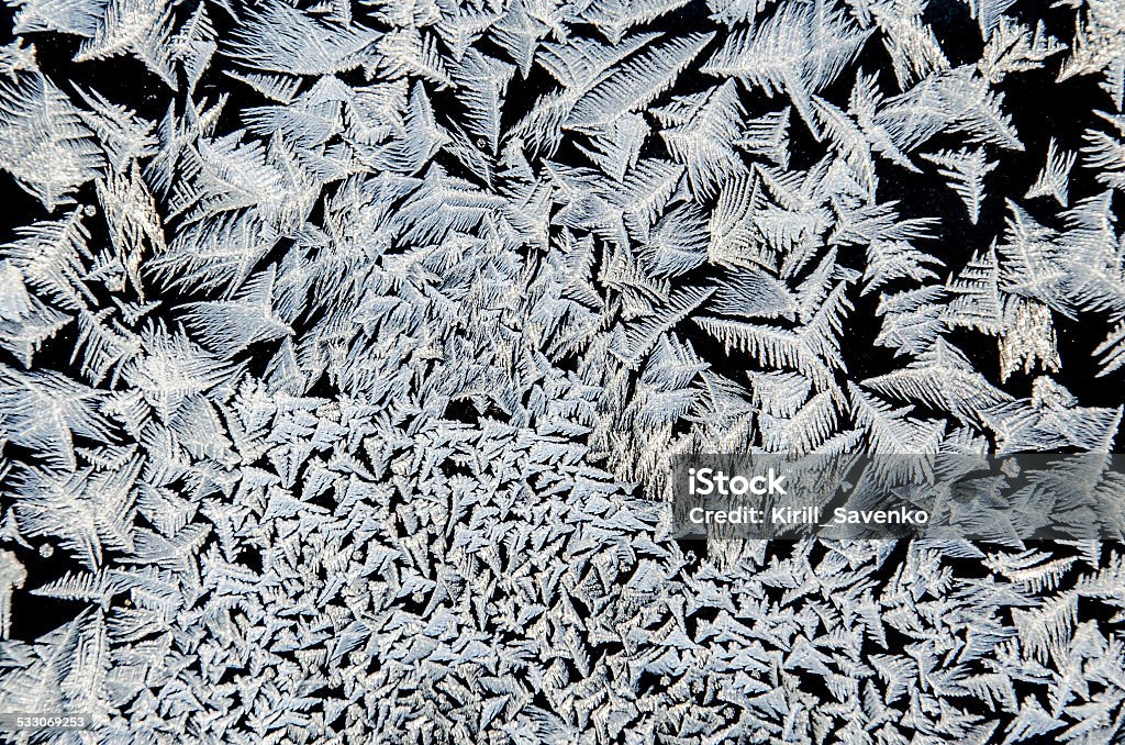 Frost Pattern Ice flower and frosty patterns on glass 2015 Stock Photo