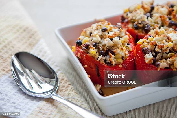 Roasted Peppers Stuffed With Corn Rice And Black Beans Stock Photo - Download Image Now