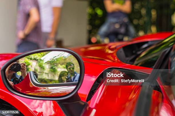 Reflection In The Outside Rearview Mirror Of A Sports Car Stock Photo - Download Image Now