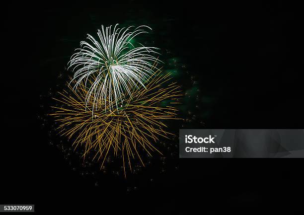 The Fireworks Celebrate Lighting The Night Sky Stock Photo - Download Image Now - 2015, Beauty, Black Color