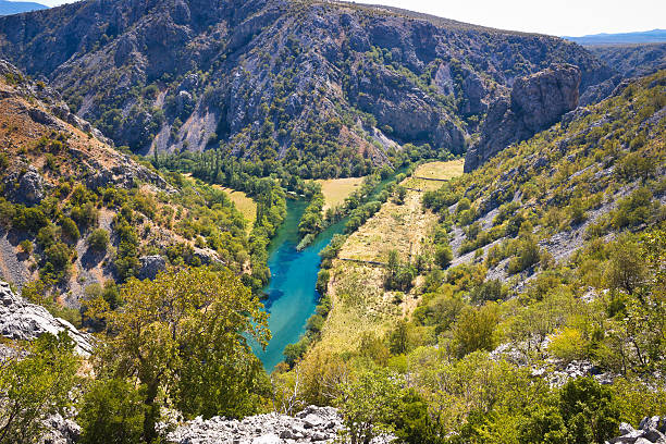 Wild landscape of Zrmanja and Krupa rivers canyon Wild landscape of Zrmanja and Krupa rivers mouth canyon, Dalmatian inland, Croatia tufa photos stock pictures, royalty-free photos & images