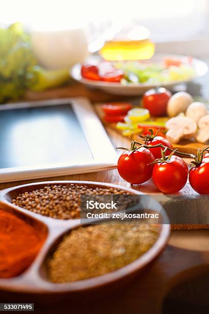 Vegetables Variety And Tablet Computer Stock Photo - Download Image Now - 2015, Bottle, Cilantro