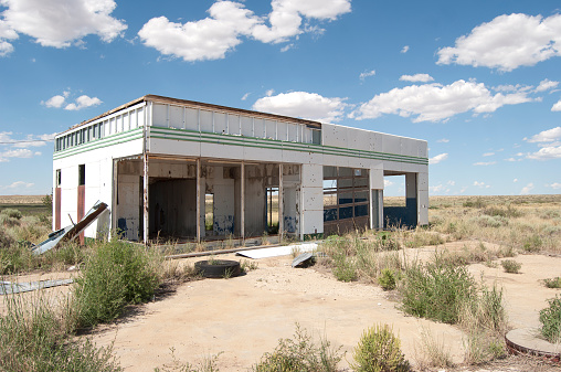 A bullet riddled derelict gas station on Route 66 in Texas just before the border with New Mexico. Made obsolete by the building of the interstate and clearly long since abandoned.