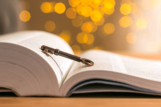 istock key and book with flares background 533071977