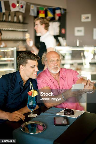 Father And Son Taking Selfie In Pattisserie Stock Photo - Download Image Now - 2015, Active Seniors, Adult