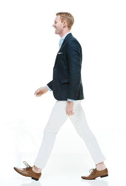 istock Fashionable man walking & looking away 533097715