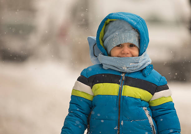 Snow Kids Snow Kids kids winter coat stock pictures, royalty-free photos & images