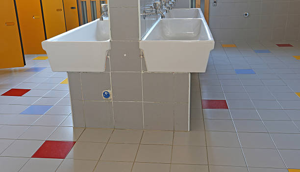 istock bathroom of the nursery school with doors yellow 533134117