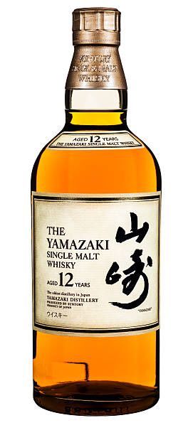 Huntly, United Kingdom - January 19, 2015: A 70cl bottle of 12 year old Suntory Yamazaki single malt whisky. Japanese whisky production dates back to 1923 with Suntory's Yamazaki taking the largest share of the internal market. The 12 year single malt is also sold for export and has proven very popular in the United States.