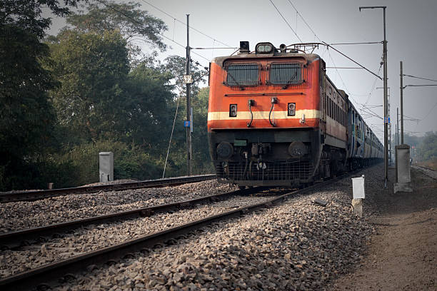 インドの旅客列車 - non urban scene railroad track station day ストックフォトと画像