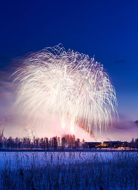 Fireworks in winter sky stock photo