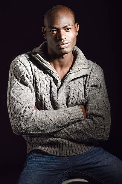 istock Black man wearing casual clothes in black background 533152917
