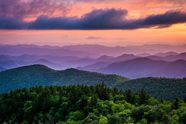 Sunset from Cowee Mountains Overlook, on the Blue Ridge Parkway Sunset from Cowee Mountains Overlook, on the Blue Ridge Parkway in North Carolina. blue ridge mountains photos stock pictures, royalty-free photos & images