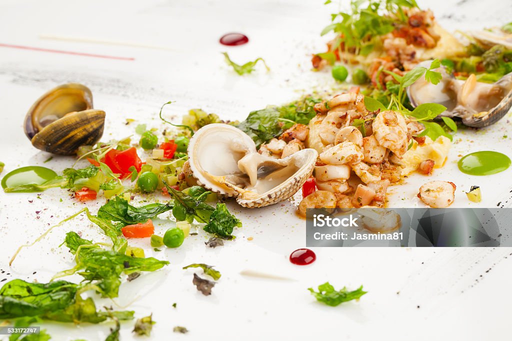 Seafood salad Seafood salad on white plate 2015 Stock Photo