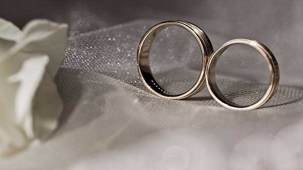 istock Gold wedding rings with precious stones 533172889