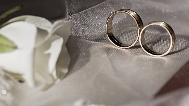 istock Gold wedding rings with precious stones 533172893