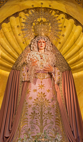 Seville - The cried Virgin Mary statue on the main altar in church Iglesia de Santa Maria de los Angeles.