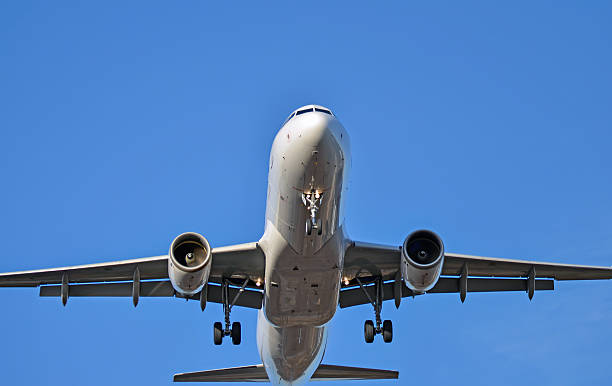istock Airplane landing to runway 533173867
