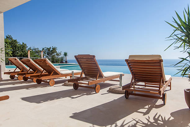 istock Luxury swimming pool and deck chair 533174687