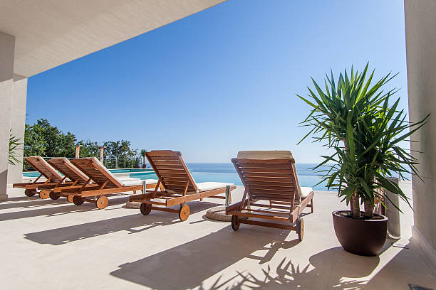 istock Luxury swimming pool and deck chair 533174689