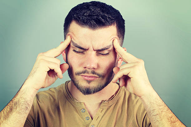 istock young man trying to relax 533177909