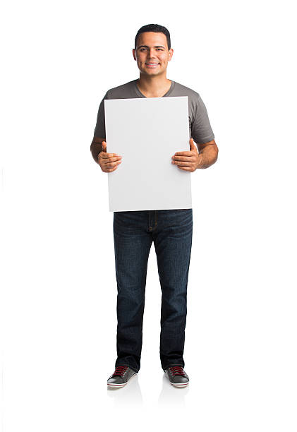 istock Happy man holding placard 533178835