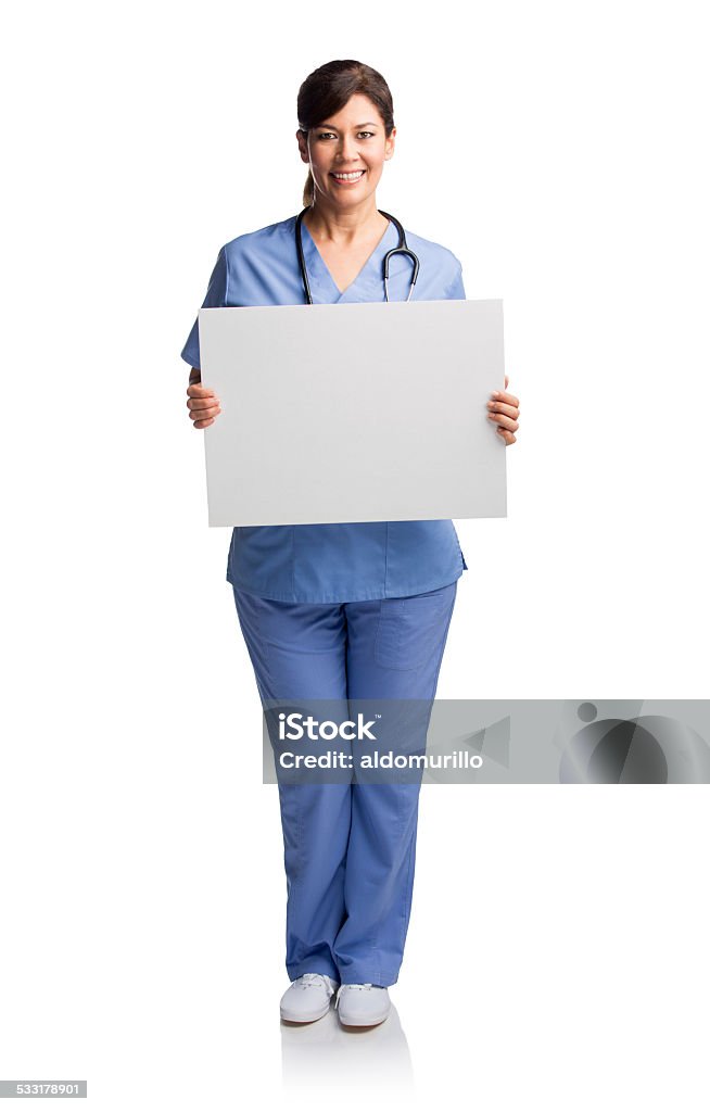 Female nurse holding a sign Portrait of a happy female nurse holding a blank whiteboard isolated over white background Blank Sign Stock Photo