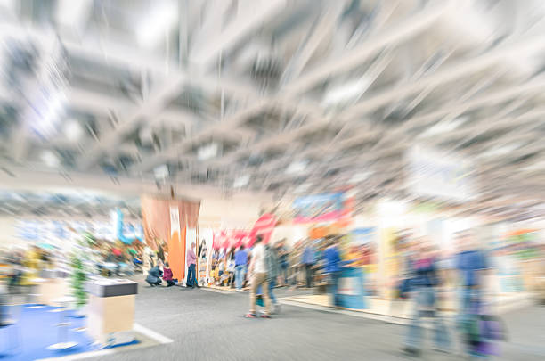 Generic trade show stand with blurred zoom defocusing Generic trade show stand with blurred zoom defocusing - Concept of business social gathering for international meeting exchange pavilion stock pictures, royalty-free photos & images