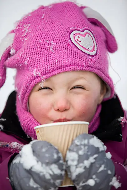Beautiful girl with are hot chocolate.