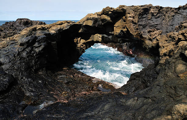 istock Entrance through Arch over ocean 533190189