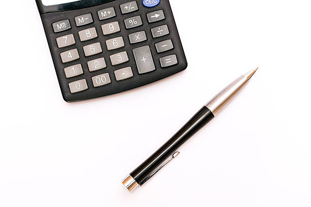 istock Business abstract - isolated calculator and elegant pen. 533192701