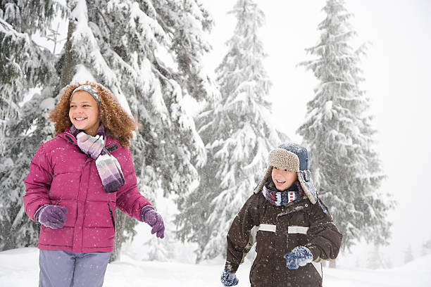 istock Children in the snow 533192733