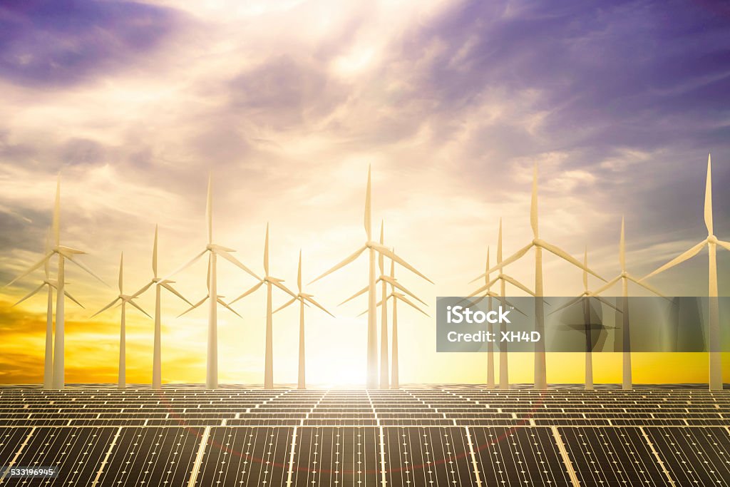 Clean power beach solar panel beach and Wind generator turbines in sea with sun set.3D physically rending high quality. Solar Panel Stock Photo