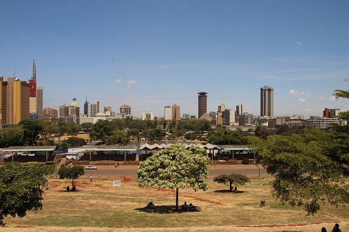 Close up view of Telkom telecommunications tower in the urban residential area of Hillbrow in Johannesburg with many skyscraper apartment blocks.