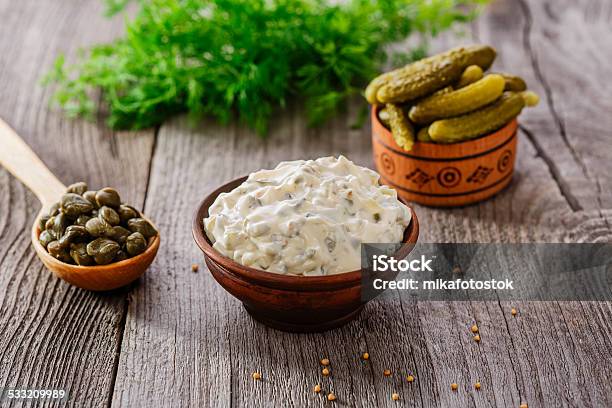 Tartar Sauce In A Gravy Boat On A Wooden Surface Stock Photo - Download Image Now - 2015, Bowl, Close-up