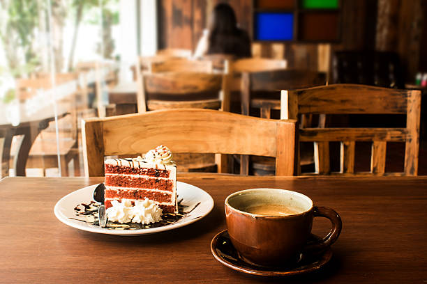 istock Coffee cup with slice of cake 533210707