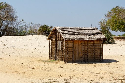 Typical malgasy village - african hut, poverty in madagascar