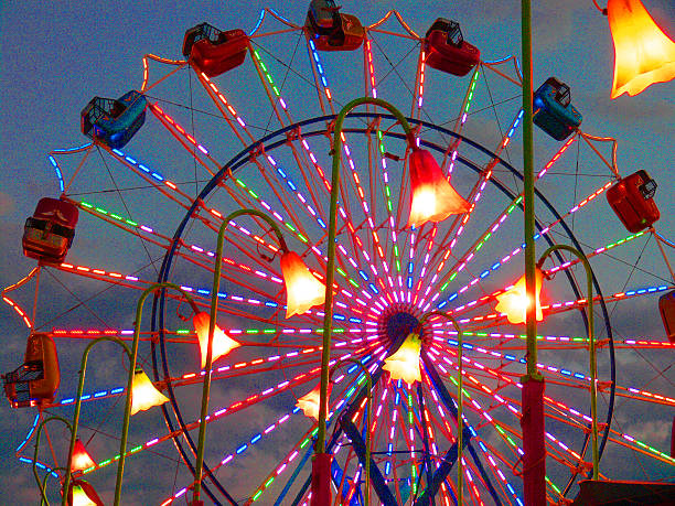 遊園地の観覧車 - ferris wheel wheel blurred motion amusement park ストックフォトと画像