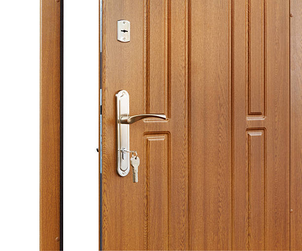 istock Open brown wooden door handle with lock 533224308