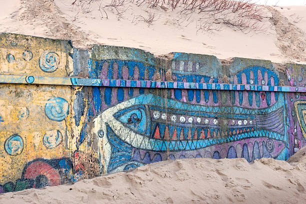 istock fragment of a concrete wall between the beach and pier 533225715