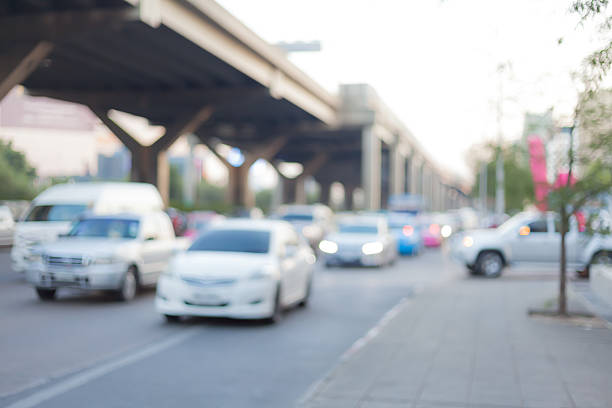 pognajcie godzinę business street - land vehicle multiple lane highway driving traffic zdjęcia i obrazy z banku zdjęć