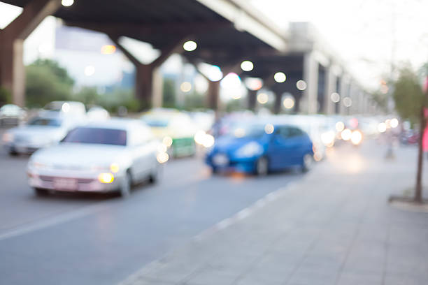 pognajcie godzinę business street - land vehicle multiple lane highway driving traffic zdjęcia i obrazy z banku zdjęć