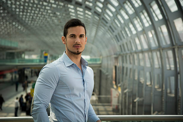 istock Handsome young man in train station or airport 533229887