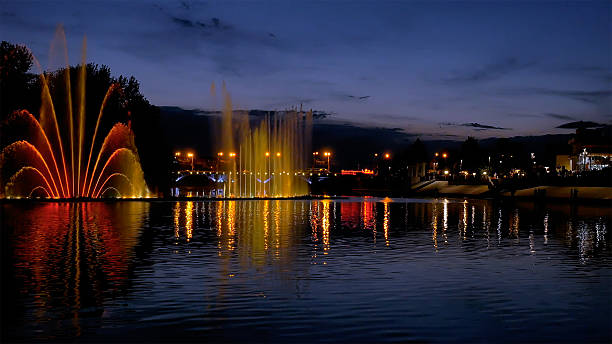 istock Colorful bright fountain with beautiful reflection 533229960