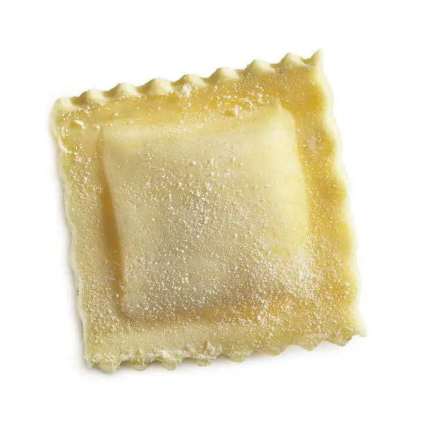 Agnolotti or ravioli isolated on white background, fresh filled pasta, typical recipe of Italian cuisine.