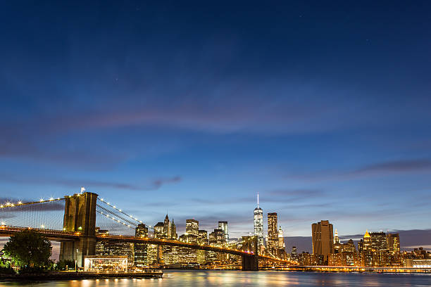 most brookliński o zmierzchu - new york stock exchange long exposure manhattan new york city zdjęcia i obrazy z banku zdjęć