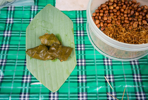 Pickled-leaf wrapped snack (Miang Kam), Sukhothai, Thailand