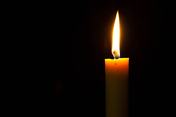 istock candle in the darkness 533232889